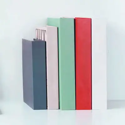 IMG-Home-Resources-c590 Stack of books on a desk